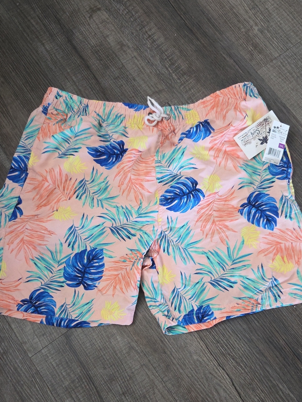 Men's Coral Swim Trunks with Blue & Teal Tropical Leaf Print